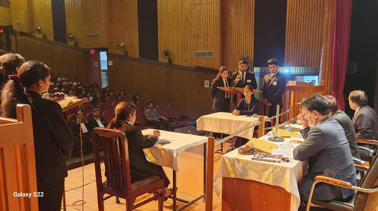 Ishan LLM students demonstrate research skills during competition. front
