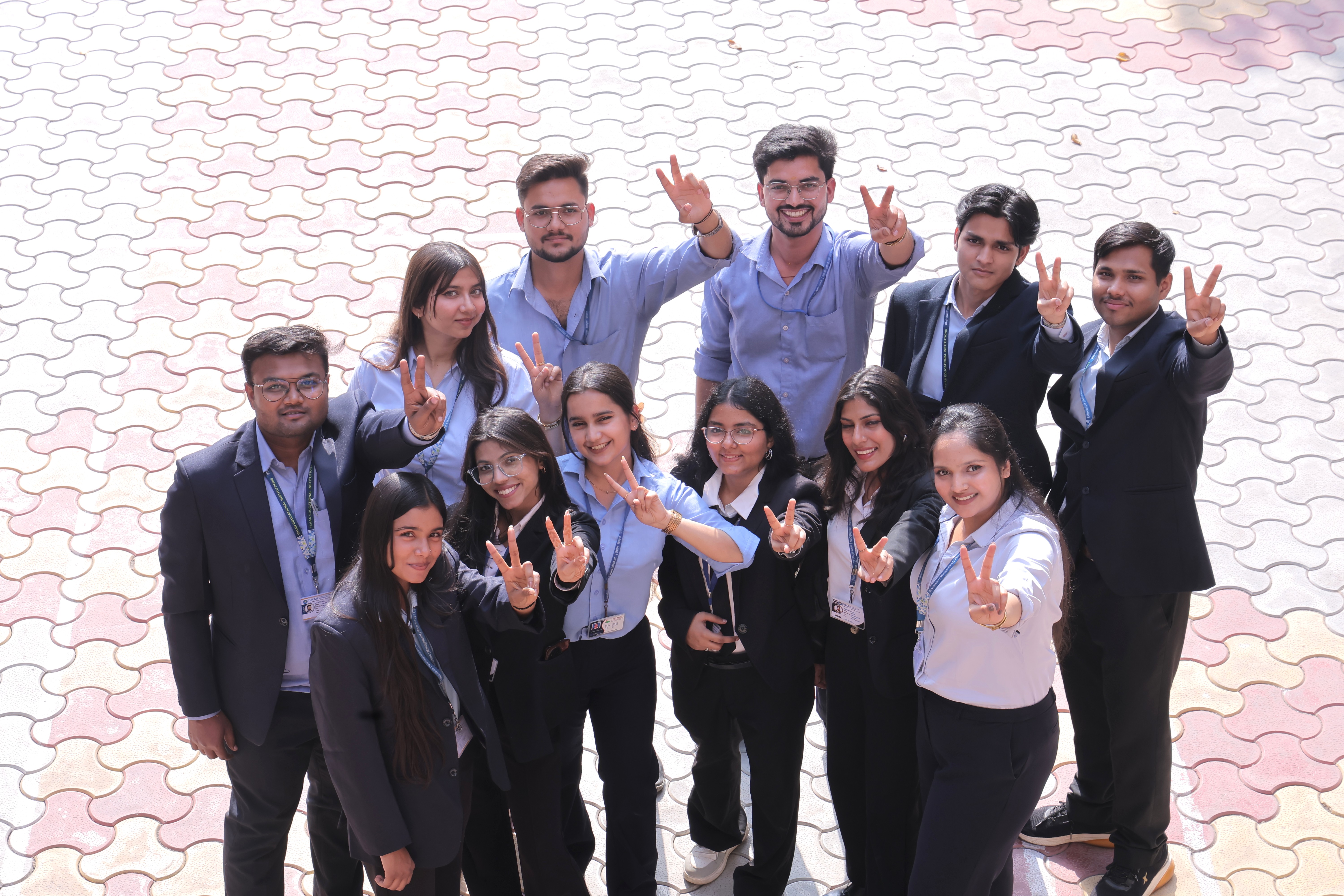 Ishan IIMT Greater Noida students celebrating academic success together.