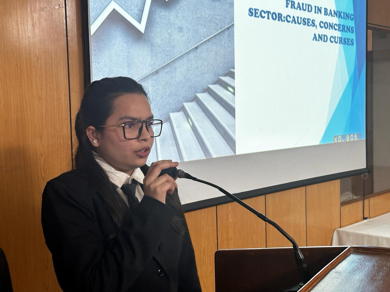 Best college Ishan LLM student presenting research work.